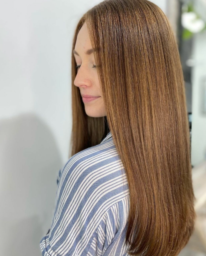 Sleek cinnamon brunette styled at Good Beauty Chicago
